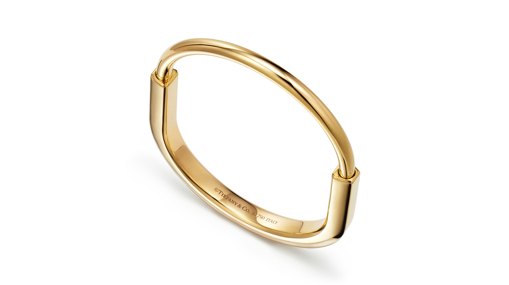 The entry-level Tiffany Lock bangle is an 18-karat gold version without diamonds, which retails for $6,800. It’s available in yellow, rose, or white gold. (Image courtesy of Tiffany & Co.)