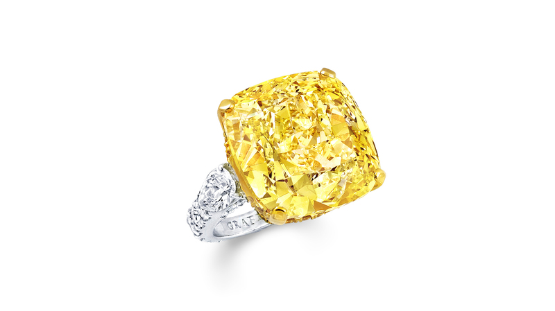 This cushion-cut fancy vivid yellow diamond ring completes the suite.