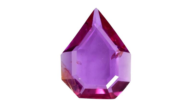 Navneet Gems and Minerals portrait-cut ruby