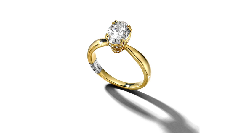 A 14-karat two-tone gold engagement ring with a 2 1/5-carat oval lab-grown diamond ($12,999). The new collection features 25 rings.