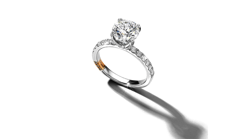 A 14-karat two-tone gold engagement ring, set with a lab-grown round diamond ($16,999). The total carat weight is 2 7/8 carats.