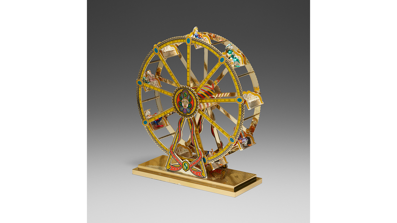 The silver gilt and enamel Ferris wheel was the top lot at auction, selling for $52,500.