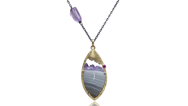 <a href="https://k-mita.com/" target="_blank">K. Mita </a> “Purple Hill” pendant in 14-karat yellow gold and oxidized sterling silver with an amethyst crystal/blue lace agate, faceted amethyst bead and pink sapphire ($1,475)
