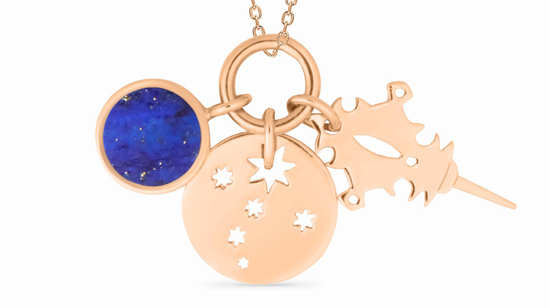 A necklace from Ginette NY’s new “Twenty” collection, featuring two 18-karat gold charms alongside a lapis lazuli disc ($780)