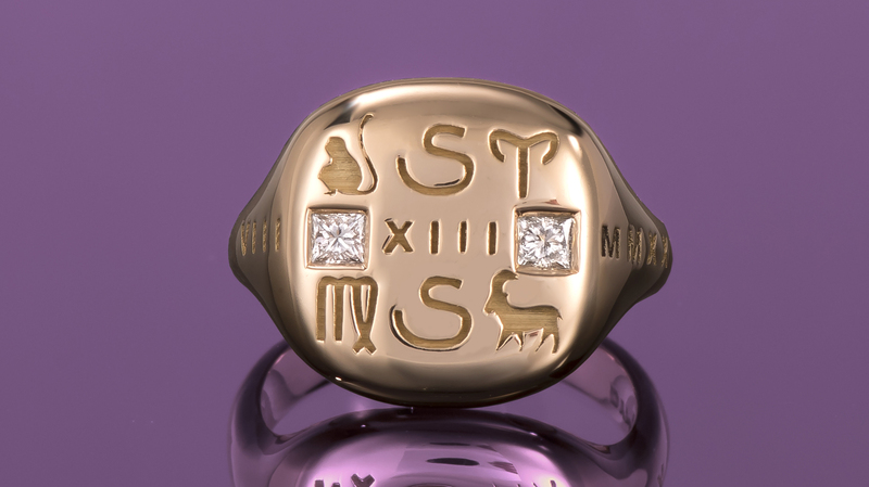 A custom “LoverGlyphs” pinky ring in 18-karat rose gold with diamonds (custom pricing begins at $4,200)