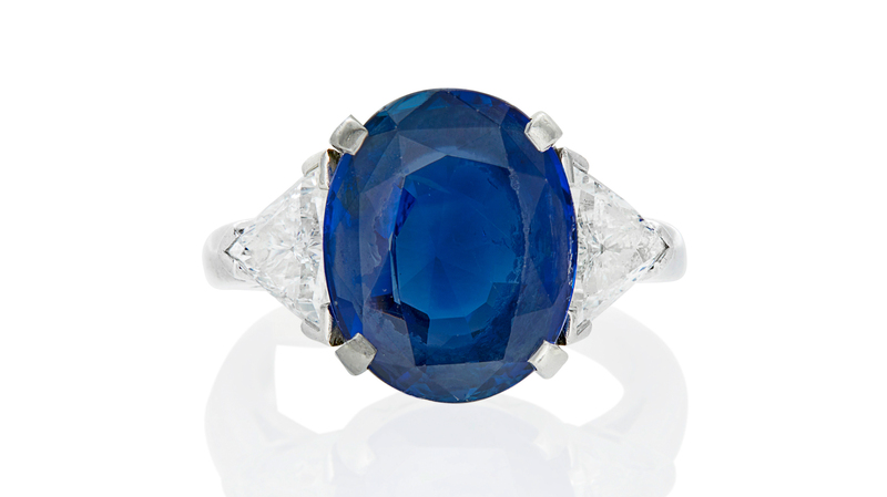 This platinum Tiffany & Co. ring, featuring an oval modified mixed-cut sapphire weighing about 5 carats and trilliant-cut diamonds weighing a total of 2 carats, went for $37,812.