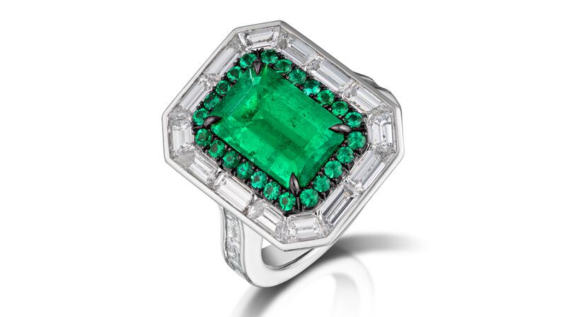 <b>Bridal Wear, First Place.</b> Gabriel Angulo of Pompos Jewelry Corporation’s platinum ring featuring a 2.55-carat rectangular emerald-cut Colombian emerald accented with 24 round emeralds (0.31 total carats), 22 custom-cut baguette diamonds (2.77 total carats), and 62 round brilliant diamonds (0.22 total carats)