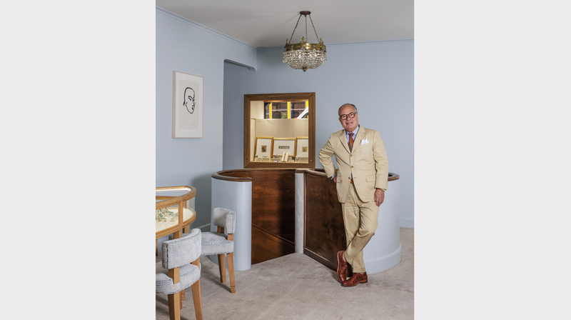 Seaman Schepps owner Anthony Hopenhajm in front of the spiral staircase at the new Madison Avenue boutique (Image courtesy of Kris Tamburello)