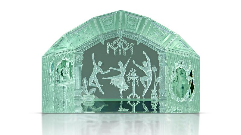 <b>Carving, First Place.</b> Dalan Hargrave of GemStarz Jewelry’s 210.55-carat ballerina carving in green beryl
