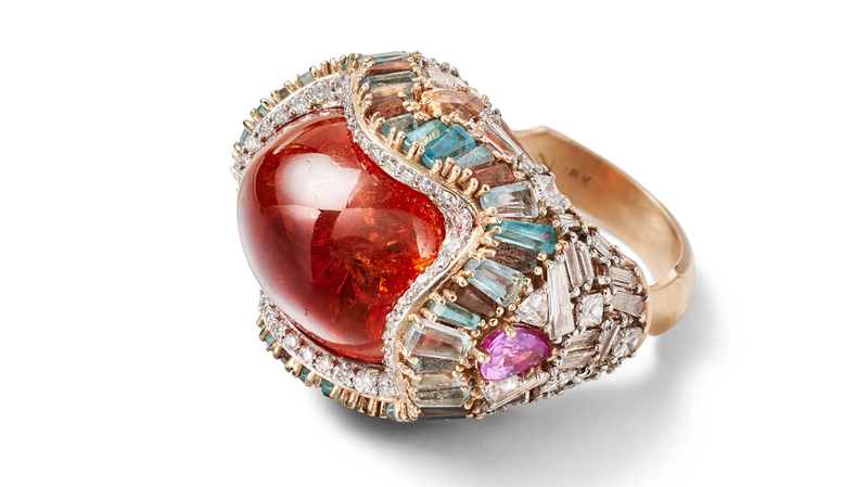 <a href="https://nakarmstrong.com/" target="_blank"> Nak Armstrong</a> 20-karat rose gold “Pleated Roman Ring” with imperial topaz, spessartite, aquamarine, white diamonds, pink diamonds, pink sapphires, labradorite, and andalusite ($37,500)