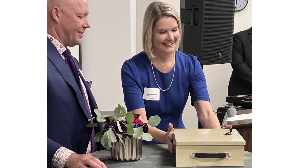 AGS Katherine Bodoh and Bryan Moeller opening time capsule