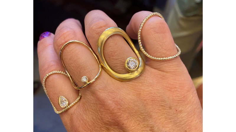 This editor modeling four versions of Fulton’s popular “Diamond Continuity” ring. The version created for Touch is on the ring finger.