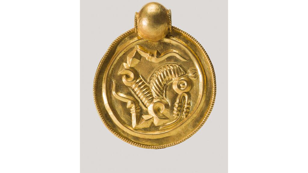 An ancient pendant inscribed with a horse from Norway
