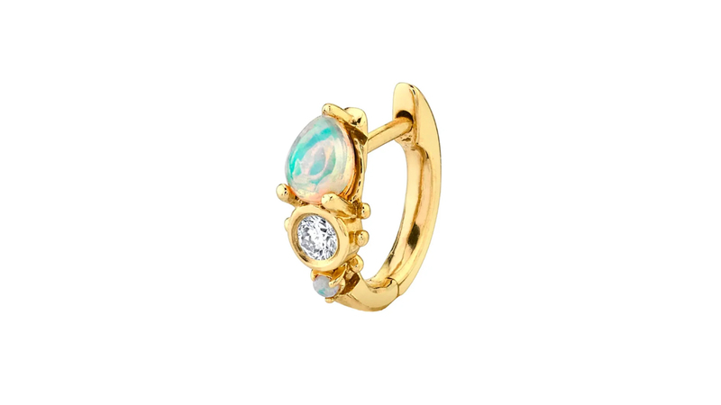 <a href="https://www.thisisthelast.com/products/multi-set-slim-hoop/?Material=14k+Yellow+Gold&Gemstone=White+Diamond+and+Opal" target="_blank">The Last Line</a> opal hoop with white diamond set in 14-karat yellow gold ($265)