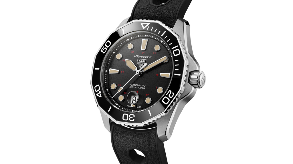 his limited-edition Aquanaut Professional 300 boasts design elements from TAG Heuer’s original diver’s watch, Ref. 844 and comes on a rubber strap. It sells for $4,350. his limited-edition Aquanaut Professional 300 boasts design elements from TAG Heuer’s original diver’s watch, Ref. 844 and comes on a rubber strap. It sells for $4,350.