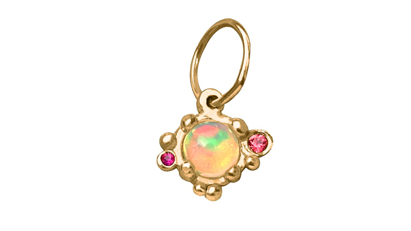 <a href="https://delphineleymarie.com/products/boheme-super-hypnose-opal-charm" target="_blank">Delphine Leymarie</a> “Boheme Opal Hypnose Luxe” charm with Ethiopian opal cabochon and pink sapphires in 18-karat recycled yellow gold ($425)