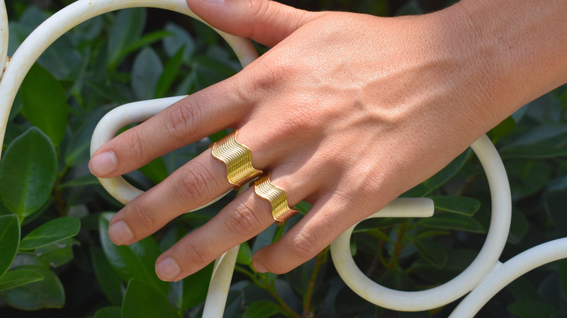 Aurelia Demark’s new “Ric Rac” rings in 18-karat yellow gold. The large size is priced at $2,725, and the smaller at $1,725.