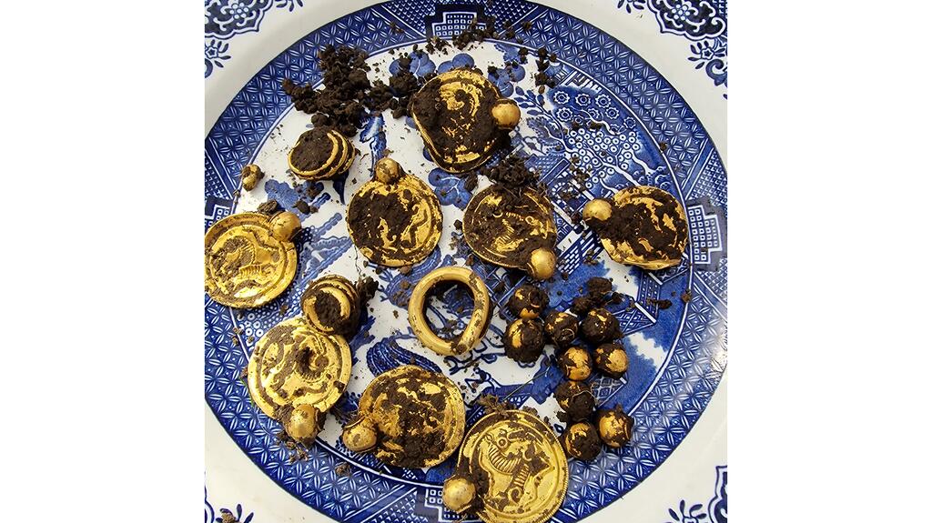 A dish of ancient jewelry found in Norway