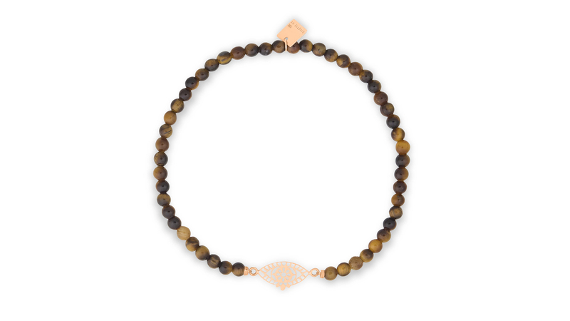 A bracelet with 18-karat gold charm and tiger’s eye beads ($300)