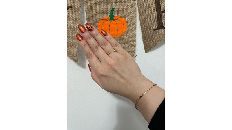 I paired my demi-fine Rocksbox ring with a bracelet that belonged to my mom and my festive Halloween nails.