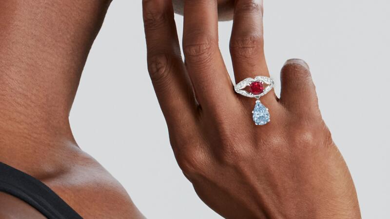 Verdura ring in platinum with 2.55-carat fancy intense blue pear brilliant-cut diamond, cushion-shaped Burmese ruby with no indication of heating, and old-cut diamonds