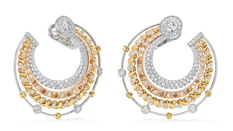 Hoop earrings showcasing the collection’s mix of metal and diamond colors