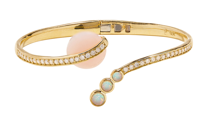 <a href="https://www.pamelalove.com/collections/all-bracelets/products/open-pave-comet-cuff-gold-pink-opal" target="_blank"> Pamela Love </a> 18-karat yellow gold “Comet” cuff with pink opal, white opal, and diamonds ($7,500)