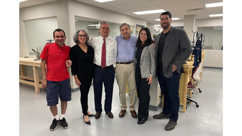 From left to right: Sam Zimmer, Robyn Zimmer, Jeff, Arnold Zimmer, Rachel Zimmer, and Adam Friedman Zimmer family