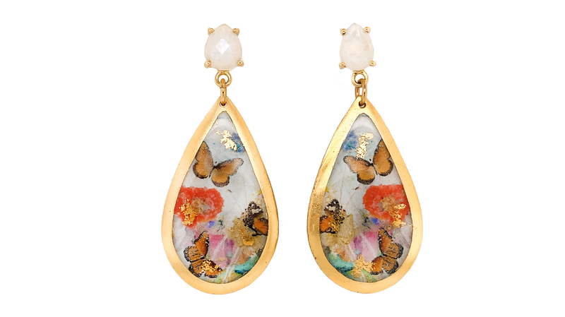 <a href="https://evocateurstyle.com/" target="_blank"> Evocateur</a> “Paradiso” medium teardrop earrings with moonstone, 22-karat gold leaf, and enamel ($238)