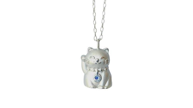 <a href="https://www.alisonnagasue.com/" target="_blank">Alison Nagasue</a> sterling silver “Hope Cat” pendant with blue sapphire ($660)