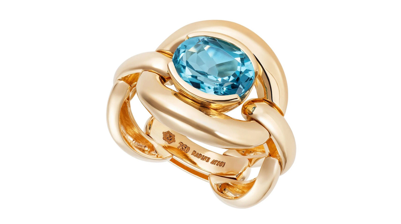 Nadine Aysoy “Catena Ring” in 18-karat yellow gold with 3.12-carat blue topaz ($4,440)