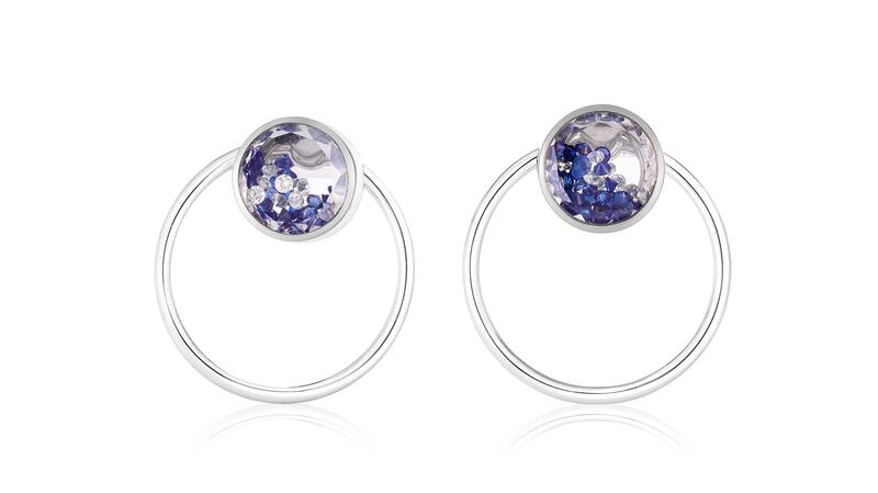 <a href="https://moritzglik.com/products/lyra-earrings" target="_blank">Moritz Glik </a> “Kaleidoscope Shakers” 18-karat gold earrings with sapphires enclosed in white sapphire ($4,950)
