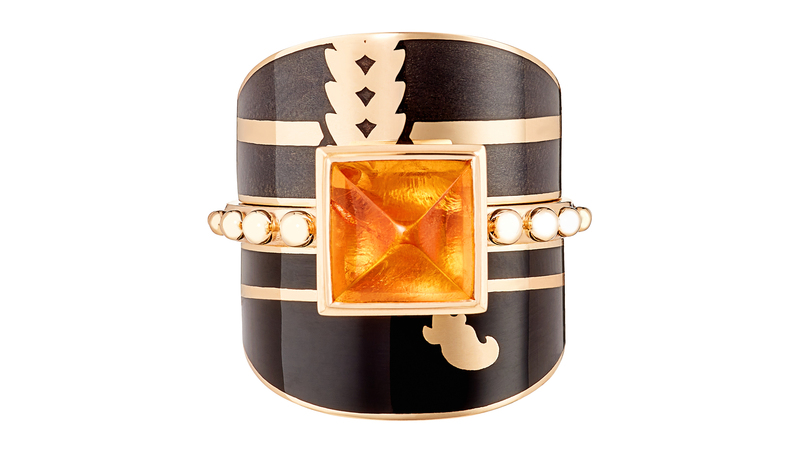 “Maharashtra Vine” ring stack with 14-karat yellow gold ring with mandarin garnet and 14-karat yellow gold jackets with lacquer enamel ($8,790 for the entire stack)
