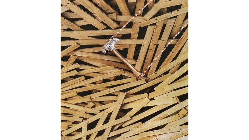 The yellow gold-plated “Hammer Home Your Message” necklace with diamond pavé ($369)