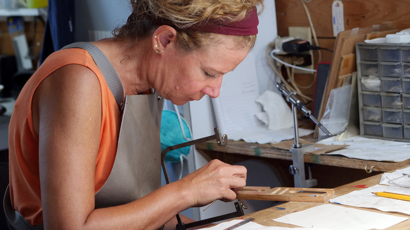 Designer Gabrielle Gould makes her jewelry by hand in St. Augustine, Florida, featuring subjects such as animals and nature informed by her experience living in coastal Florida.