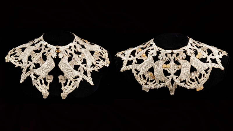 The “Chantecler” large collar was created for actress Sarah Bernhardt in the play of the same name. It features openwork leather embroidered with silk, depicting roosters that are applied with enamel and accented by glass berry motifs, and features a cabochon citrine on the clasp (€150,000-€200,000, or $169,400-$226,000).