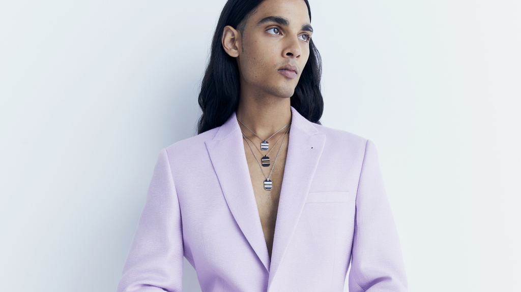 These pendants reminiscent of dog tags are available in 18-karat white gold with diamond pave or titanium and 18-karat rose gold. These pendants reminiscent of dog tags are available in 18-karat white gold with diamond pave or titanium and 18-karat rose gold.
