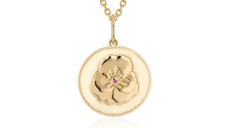 Heavenly Vices “Pansy Medals of Meaning” in 14-karat yellow gold with a pink sapphire