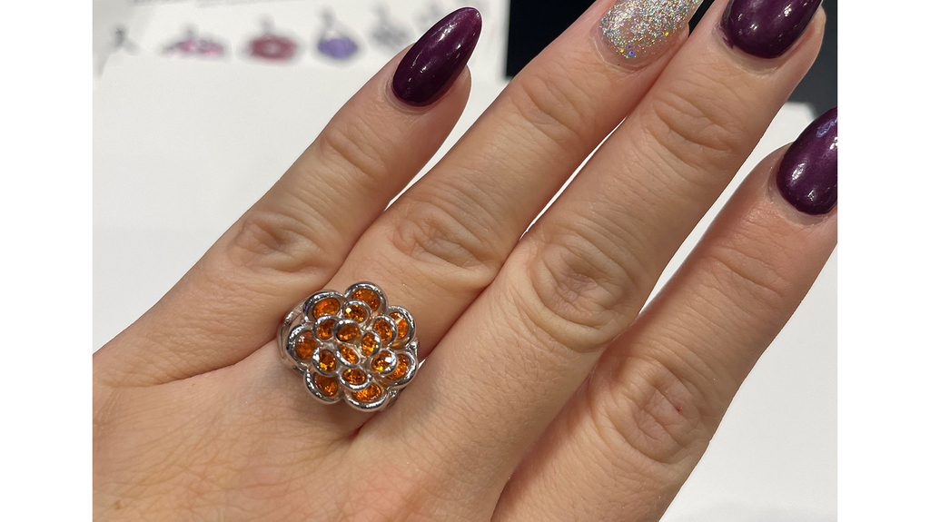 A silver and crystal marigold ring by RockLove Jewelry, inspired by the Pixar movie “Coco” ($125)