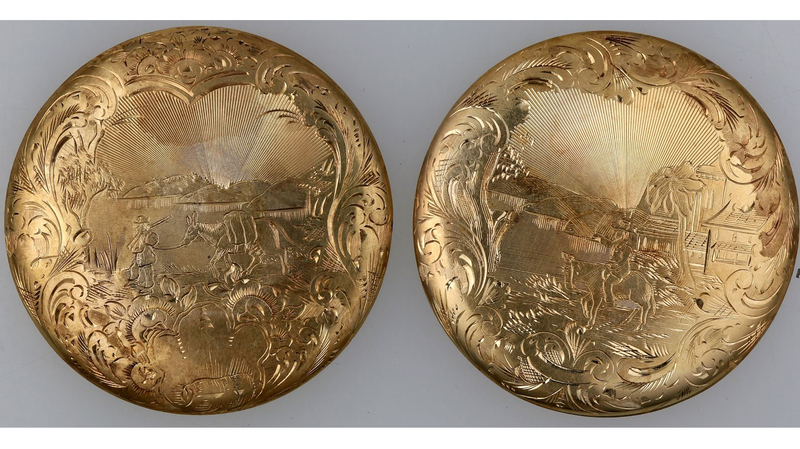 These two gold watch case covers were one of Holabird’s top lots, selling for $26,400 in the auction (compared with a pre-sale estimate of $5,000). One side has an engraving of a miner leading his pack burro with supplies away from Yerba Buena (the early settlement that became San Francisco) while the other shows the miner heading out of town with San Francisco in the background.