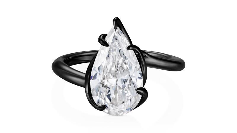 <a href="https://www.thelmawest.com/" target="_blank">Thelma West</a> 18-karat gold and black ceramic Rebel Black Ring with a pear-cut diamond center (price available upon request)