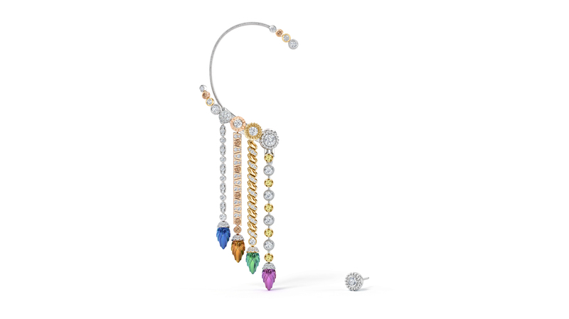An ear cuff with removable titanium drops that can be attached to a charm bracelet.