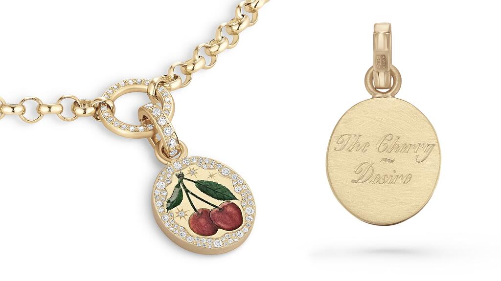 The “A Cherry For Desire” pendant in 18-karat yellow gold with champlevé enamel, diamonds, and an engraving reading “The Cherry ~ Desire” on the reverse ($9,563 for pendant, $13,928 with belcher chain) Cece Jewellery A Cherry For Desire Pendant