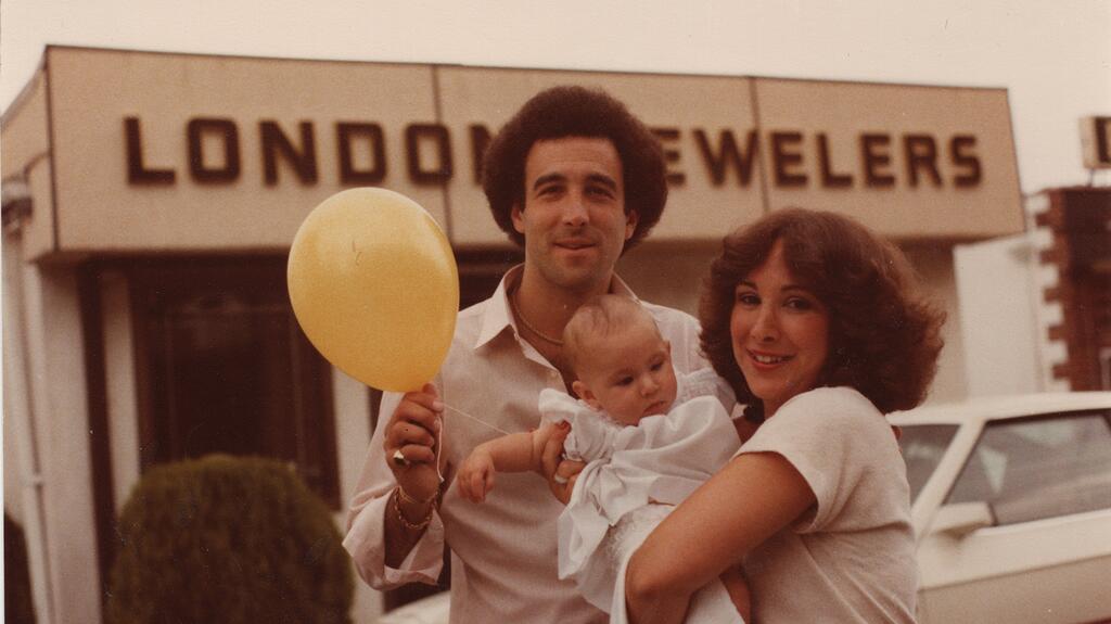 Mark and Candy celebrated two major milestones in 1980—the birth of their first child, daughter Randi, and the opening of London Jewelers’ second store in Wheatley Plaza. Mark and Candy with baby Randi at the new London Jewelers store