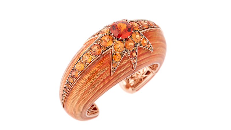 Selim Mouzannar one-of-a-kind bangle from the Aïda collection in 18-karat gold with orange enamel, a 30.26-carat spessartite garnet, and 0.99 carats of sapphires ($100,570)