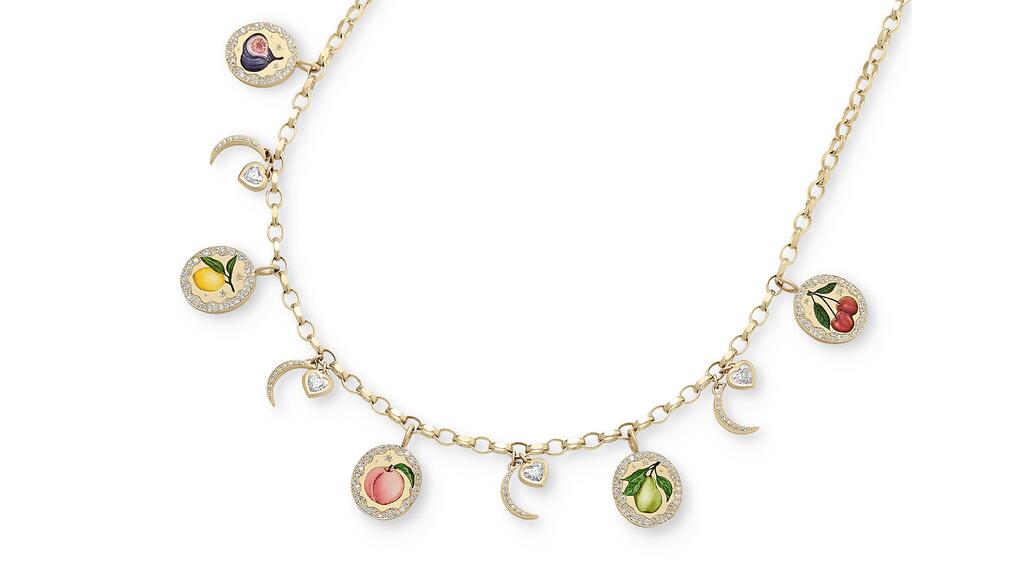 The “For the Love of Fruit” necklace with the five fruit pendants from the “For the Love of Fruits” collection, and four heart and crescent moon charms on an 18-karat yellow gold belcher chain ($60,839) Cece Jewellery For the Love of Fruit Necklace
