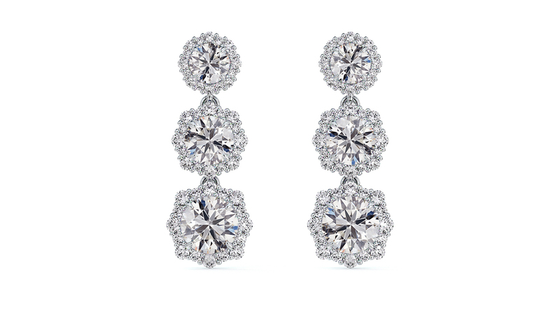 <a href="https://www.forevermark.com/en-us/products/center-of-my-universe-floral-halo-drop-earrings-16053/" target="_blank"> De Beers Forevermark</a> Center of My Universe floral halo drop diamond earrings set in platinum ($13,350)