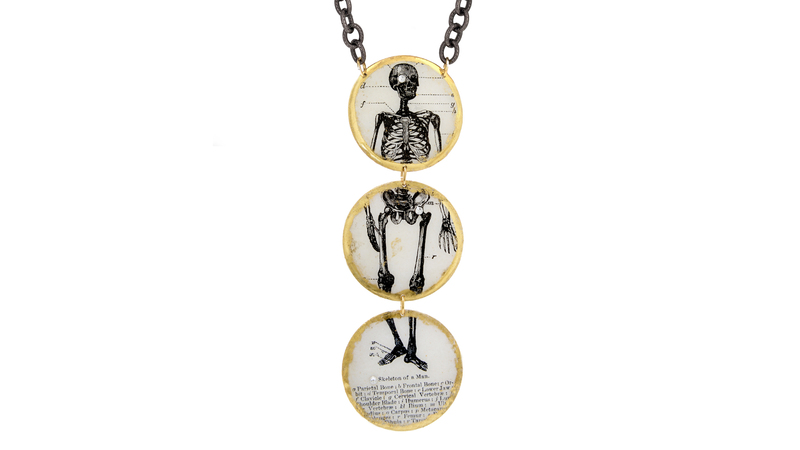 <a href="https://evocateurstyle.com/products/skeleton-necklace-3part" target="_blank">Evocateur</a> 22-karat gold leaf and enamel skeleton necklace ($408)