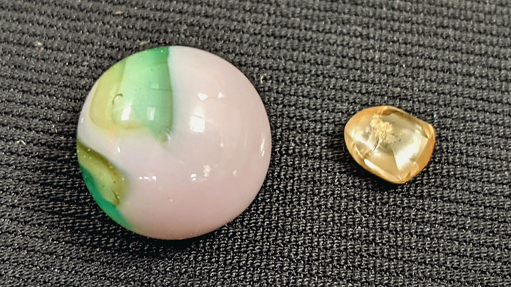 The 2.20-carat diamond, pictured here, has been name the “Washington Sunshine.” The 2.20-carat diamond, pictured here, has been name the “Washington Sunshine.”