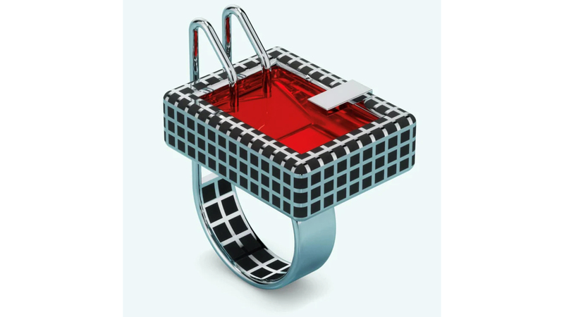 <a href="https://studiocult.co/collections/rings/products/bloodbath-ring" target="_blank"> Studiocult</a> “Bloodbath” ring in sterling silver with resin and black enamel tiles ($375)